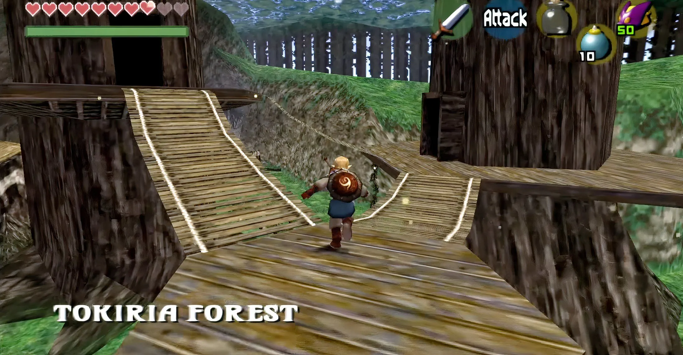 Gameplay de Zelda: Indigo na Tokiria Forest com o HUD clássico do N64, level design feito à mão dentro das limitações do hardware original